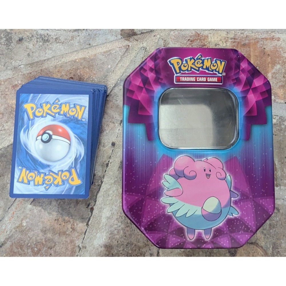 Pokeman Blissey tin (empty) With Over 75 Random Pokeman Cards